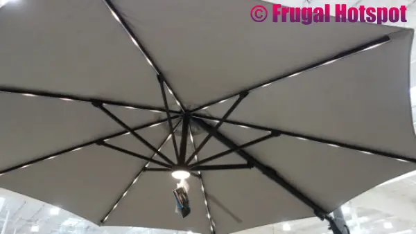 Seasons Sentry 11' Round Solar LED Cantilever Umbrella inside view | Costco Display