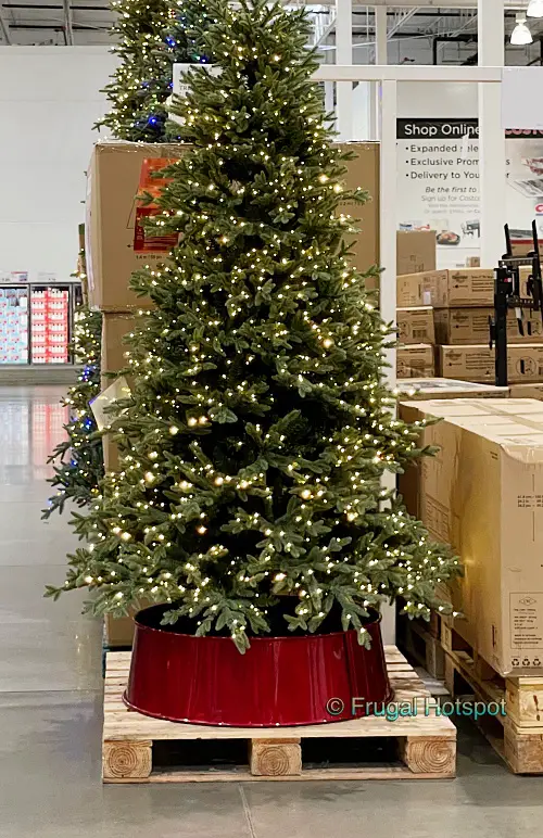 Red tree collar under a Christmas tree | Costco